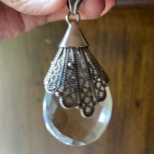 Beautiful crystal quartz pendant. Like new. Can be worn with many necklaces.
